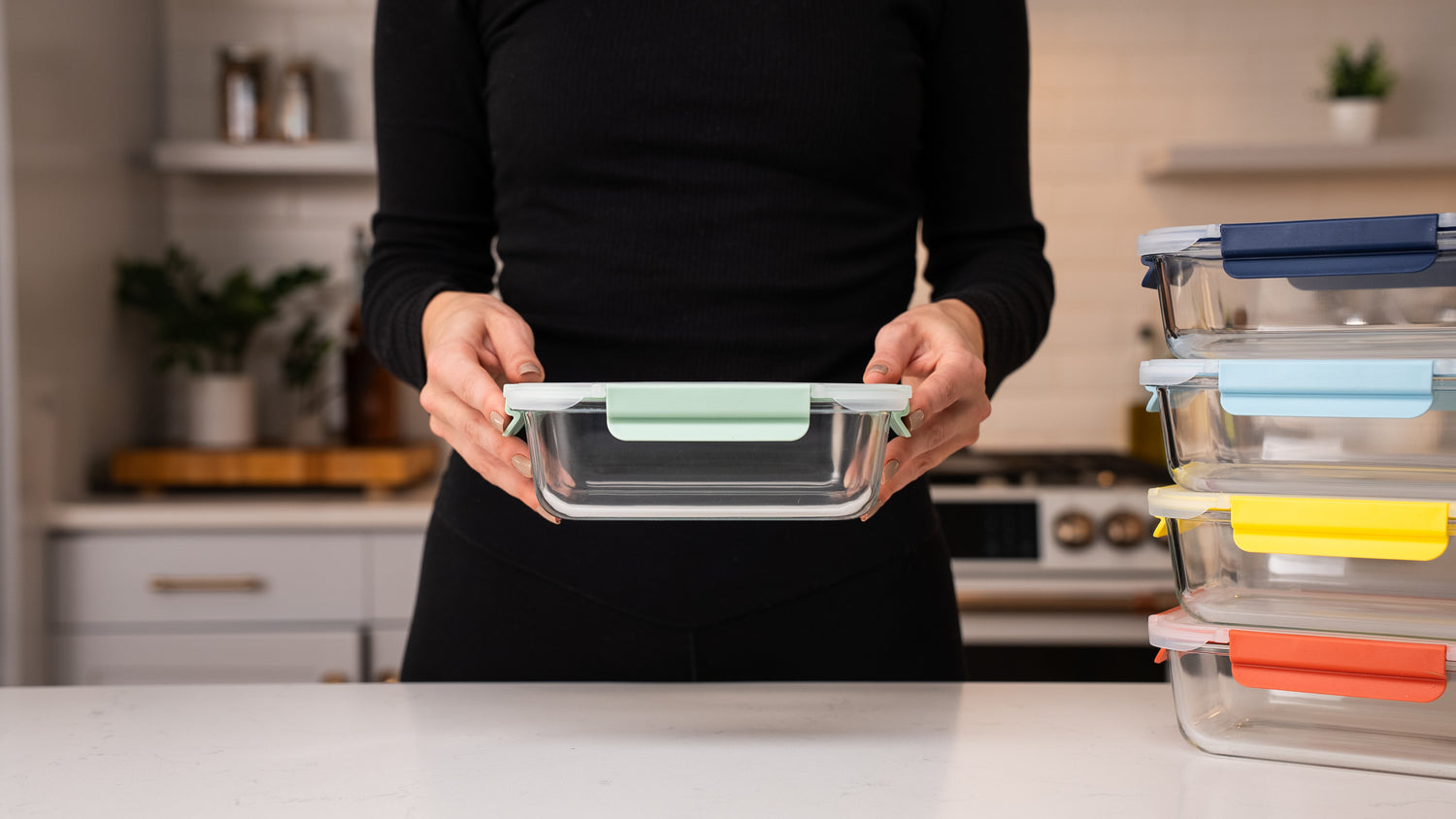 Close-up of Ceywa airtight lids on borosilicate glass food containers, leakproof kitchenware