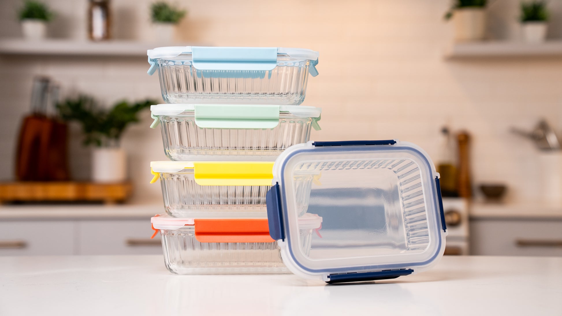 Ceywa 5-piece glass food storage container set with colorful airtight lids on kitchen countertop